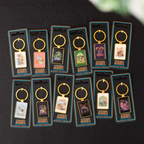 Set of 12 Enamel Keyrings by Steven Rhodes