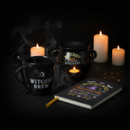 Witches' Brew Gift Set featuring Witches Brew mug and spoon, cauldron oil burner and wax warmer, and Witch's Notes Toadscrawl A5 notebook